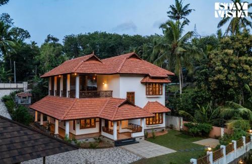Nedumangad Villa | StayVista at Neelambari Villa with BBQ & Bonfire