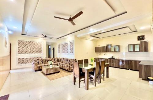 Kuthar Apartment | Red and Blue Apartments by grotto peace
