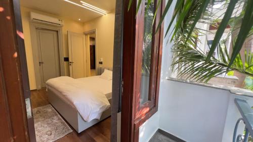 Rohini Apartment | Elegant Escape Modern 2BHK with Living Room