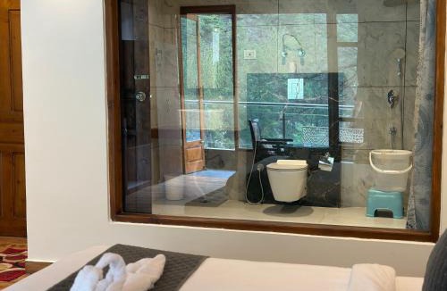 Kasol Hotel | Hotel Asiia Holiday with Swimming Pool -Central Heated and Air Cooled, Near mall road