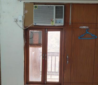 Sainik Farm Apartment | Private 1BHK Retreat Forest View Kitchen Free WiFi