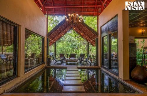 Turiya Villa | StayVista at Vannraj Farm Villa with Shared Pool & Bonfire