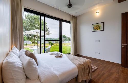 Bandhwari Villa | ELIVAAS Signature Gardenia 4-BHK Farmhouse with Private Pool, Game Zone, & Lush Garden