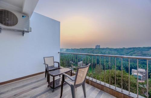 Dabolim House | MidPoint Uno Pet-friendly 1 Room Retreat with shared pool, Entertainment Area and kids area Near Dabolim Airport