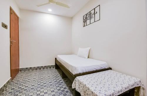 Holy Cross Colony Hotel | Super Hotel O Dabolim Near Goa International Airport