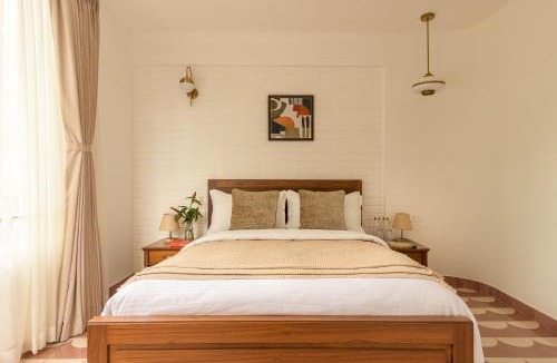 Nerul Apartment | El Volar by The Blue Kite - 2BHK, 5 Mins to Casino & 10 Mins to Candolim Beach with Big common Pool, Fully Equipped Kitchen, 24x7 Security, WiFi