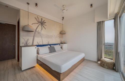 Harnai Villa | SaffronStays Nautica - 5BR hilltop villa with rooftop pool, sea views & modern interiors surrounded by greenery