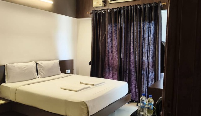 PRATHAM INN BY DOWNTOWN HOTELS