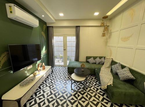 Ardra 1BHK Apartment Stylish Tropical Stay MI Road Jaipur